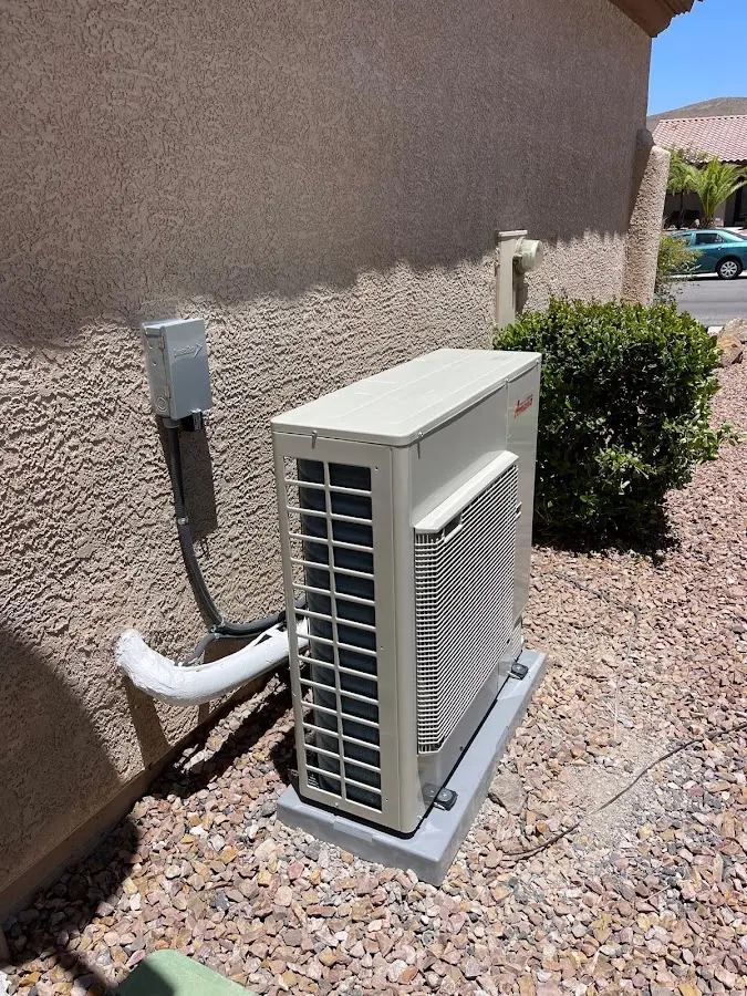 Residential air conditioning condenser unit in Beekman
